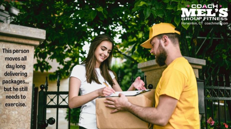Man in yellow shirt delivering package to young woman.
